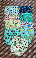 Reusable organic cloth button diaper with single pad